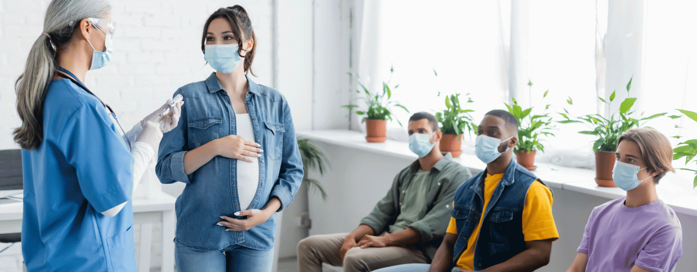 Pregnant woman waiting for a flu vaccine